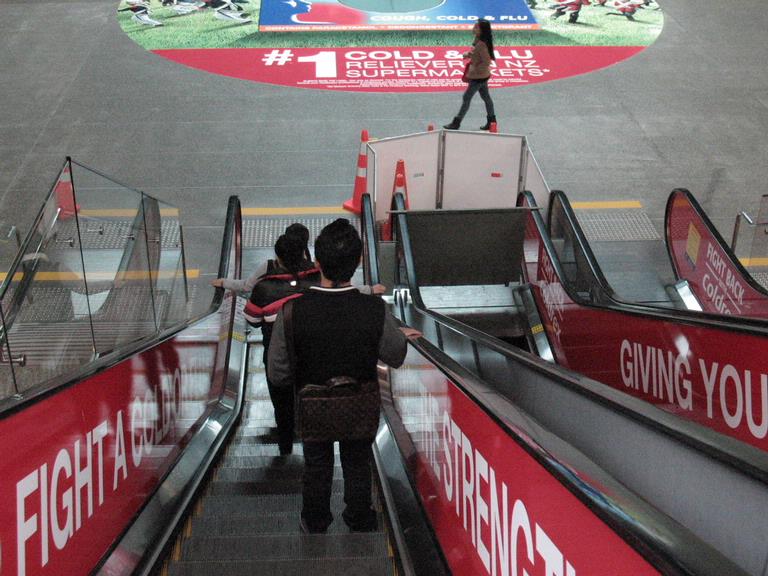 Stuart Weekes; The bright colours of Auckland; Riding the escalators at Britomart