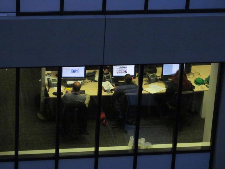 Joan Kirk;Working late;Taken from opposite apartment block