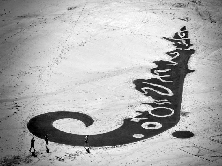 Karen Lewis; Momentary Art; Fabulous sandart at Murawi Beach Feb 2014