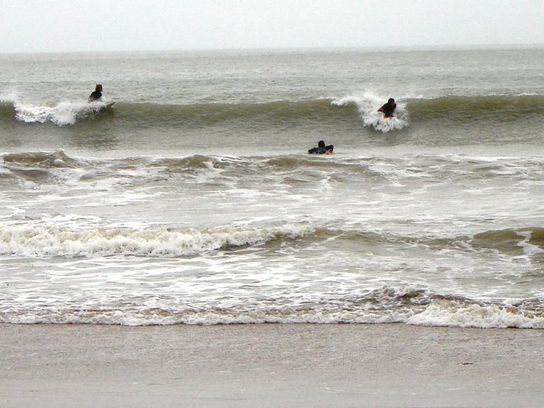Sam; Surfing the waves; Takapuna 2011