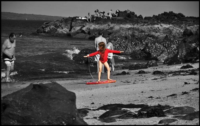 Candida Rolla;Little red riding waves;Thorne Bay, Auckland. January 2015