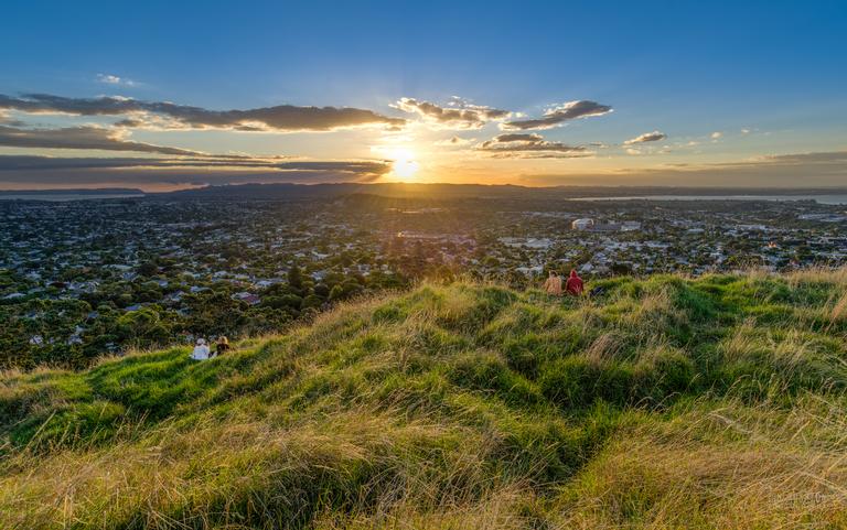 Ian Rushton;Soaking up the sunset 2;Watching the sun go down from Mt Eden summit.
