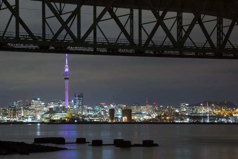Carolina Dutruel; Royal Tower; The Sky Tower, dressed in purple to honor the Royal Family