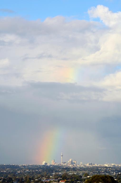 Jago Neal; Rainbow over Auckland; I had just popped out to get the Friday night takeaway when I saw this beautiful rainbow highlighting the city. Luckily I had my camera with me and stopped the car to take this from Glengarry road in West Auckland.
