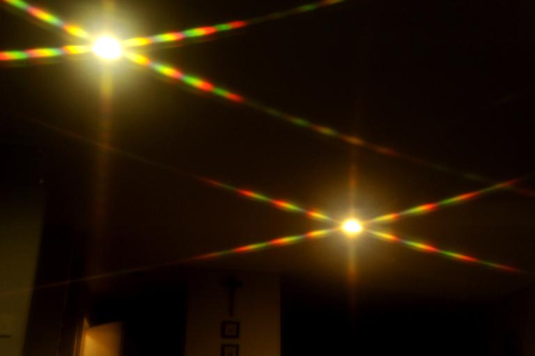 Sun Ha Hwang;Mysterious Reflections of Room Lights;We happened to find mysterious colours of lights reflected on our TV screen. We took a picture of it as shown.
