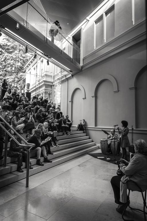 Paul Su;Applause;Took this photo at Auckland Art Gallery, people applaud after the singer gave a great performance.