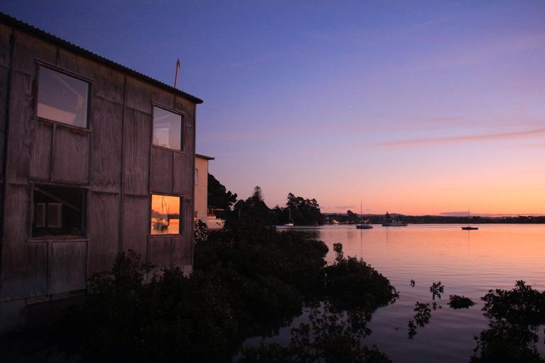 Su Leslie;Room with a view;As the sun set at Greenhithe wharf, a single boat was reflected in the glow.