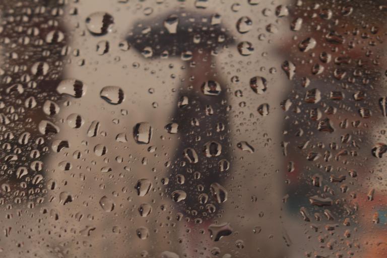 Amie Kaufman; Precipitation; This image I took by using a cut out of a portrait from one of my previous shoots and placed it behind a sheet of plastic with water droplets on it. This has been by far my favorite Photo shoot.