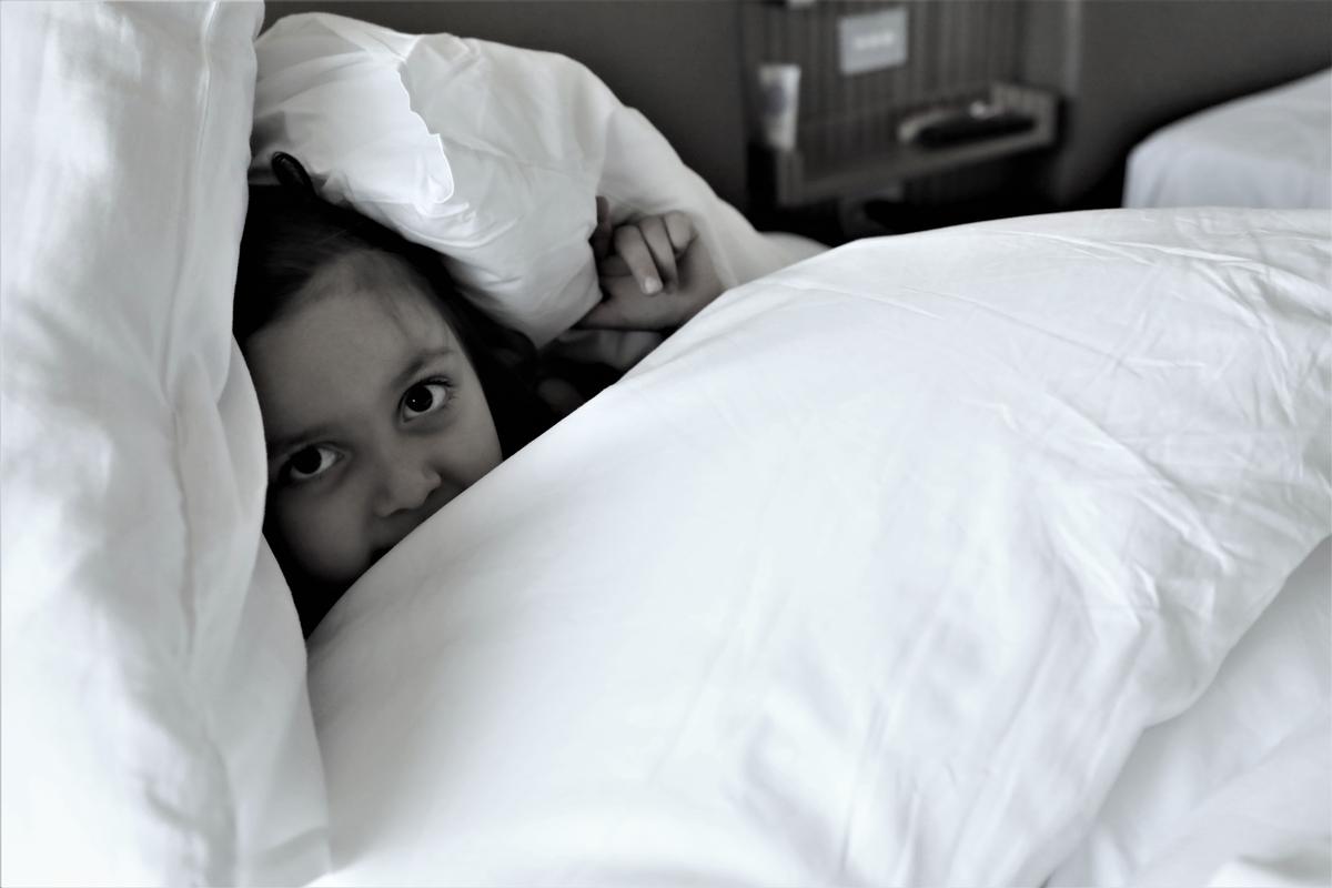 Shobna; Hotel quarantine games; My daughter playing pillow games in the hotel room we are quarantined in after returning home from overseas.