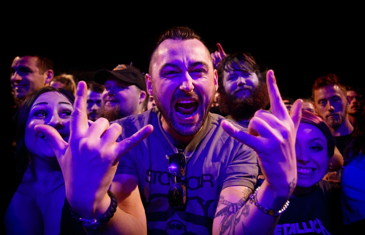 Dave Simpson; Stone Sour Music Fans at Spark Arena;Photographers stand in the energy zone between the performance and their audience.  Without the audience there is no show.