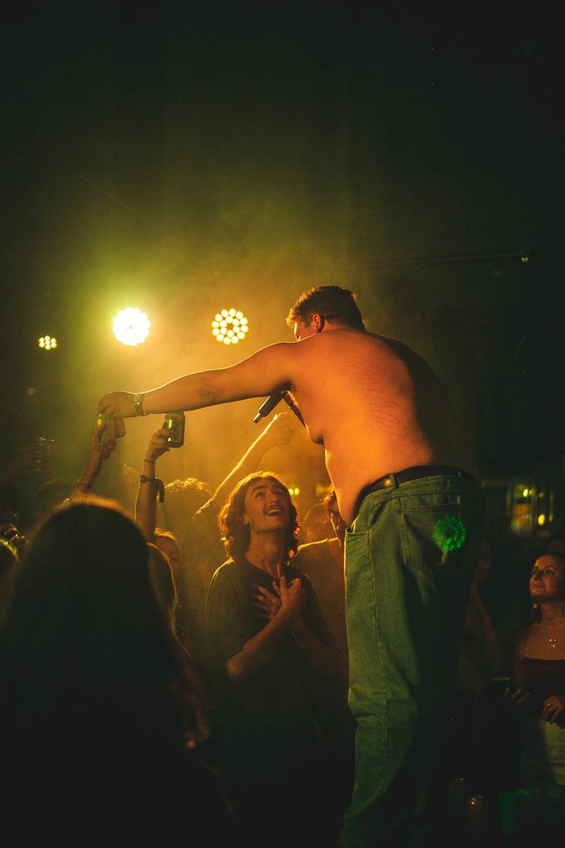 Fran Scrimgeour;Wax Mustang or is it Jesus?;Photo taken at the afterparty of Electric Avenue 2021. A beautiful Mo looks up at Wax like he's Jesus