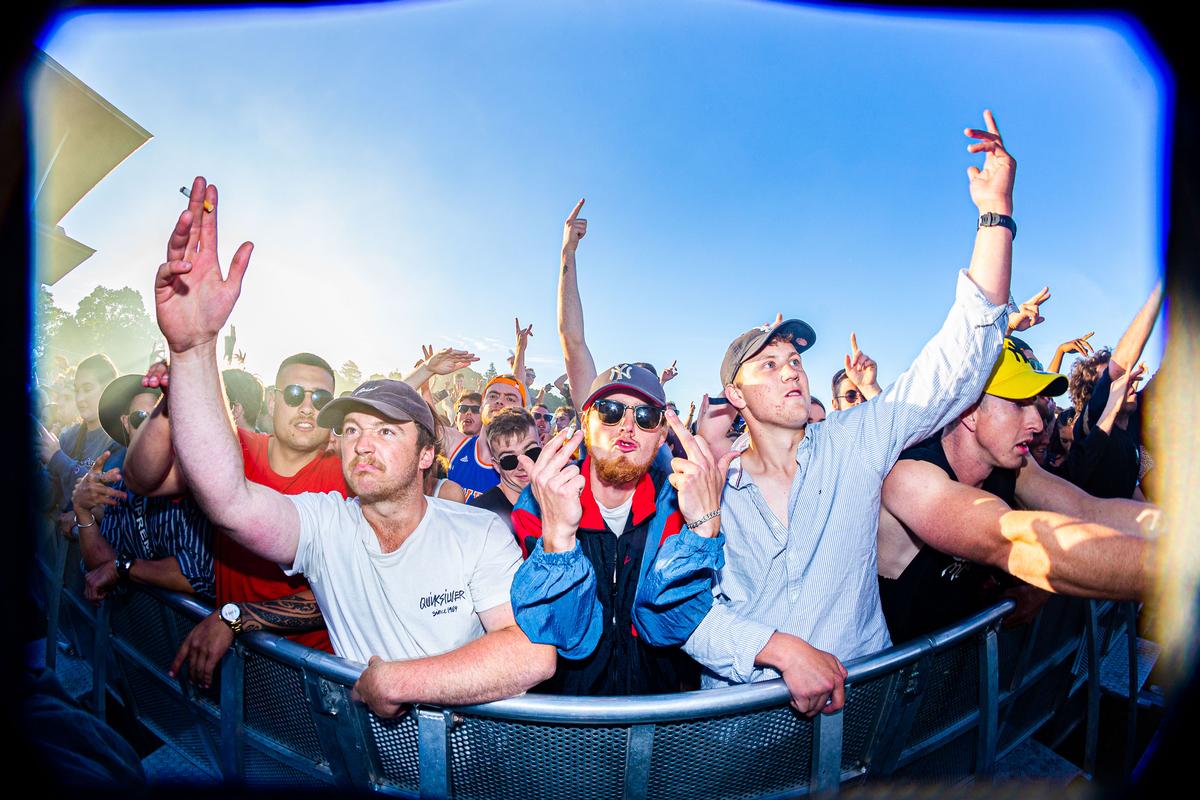 Lucas Perelini; The Holy Trinity; Punters in the front row at Noisia, Christchurch. 29/12/19