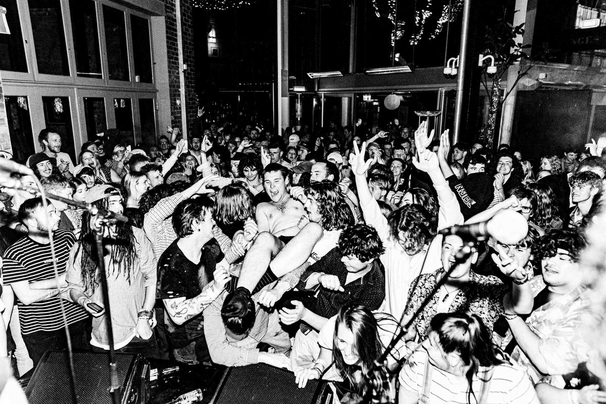 Lucas Perelini; Stage Divin; Thomas of Dolphin Friendly dives into the crowd at Stranges Lane. 21/12/19