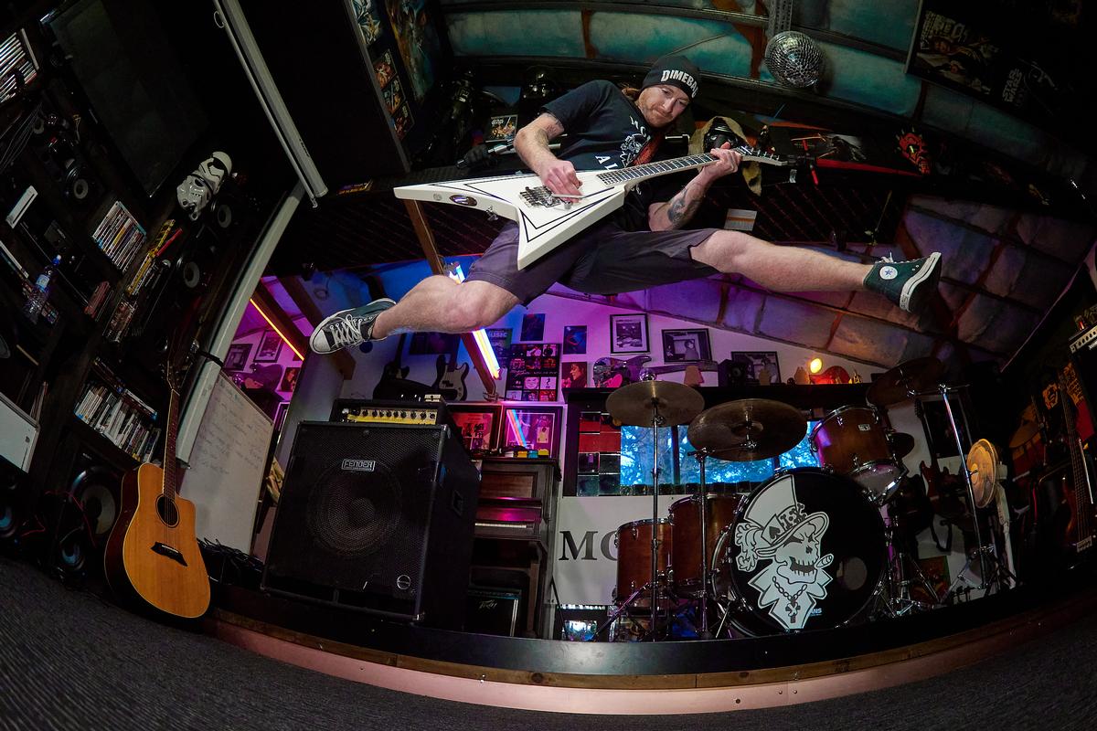 Reef Reid;Brodie;Bro D, executing his Eddie Van Halen jump in honour of the guitar great