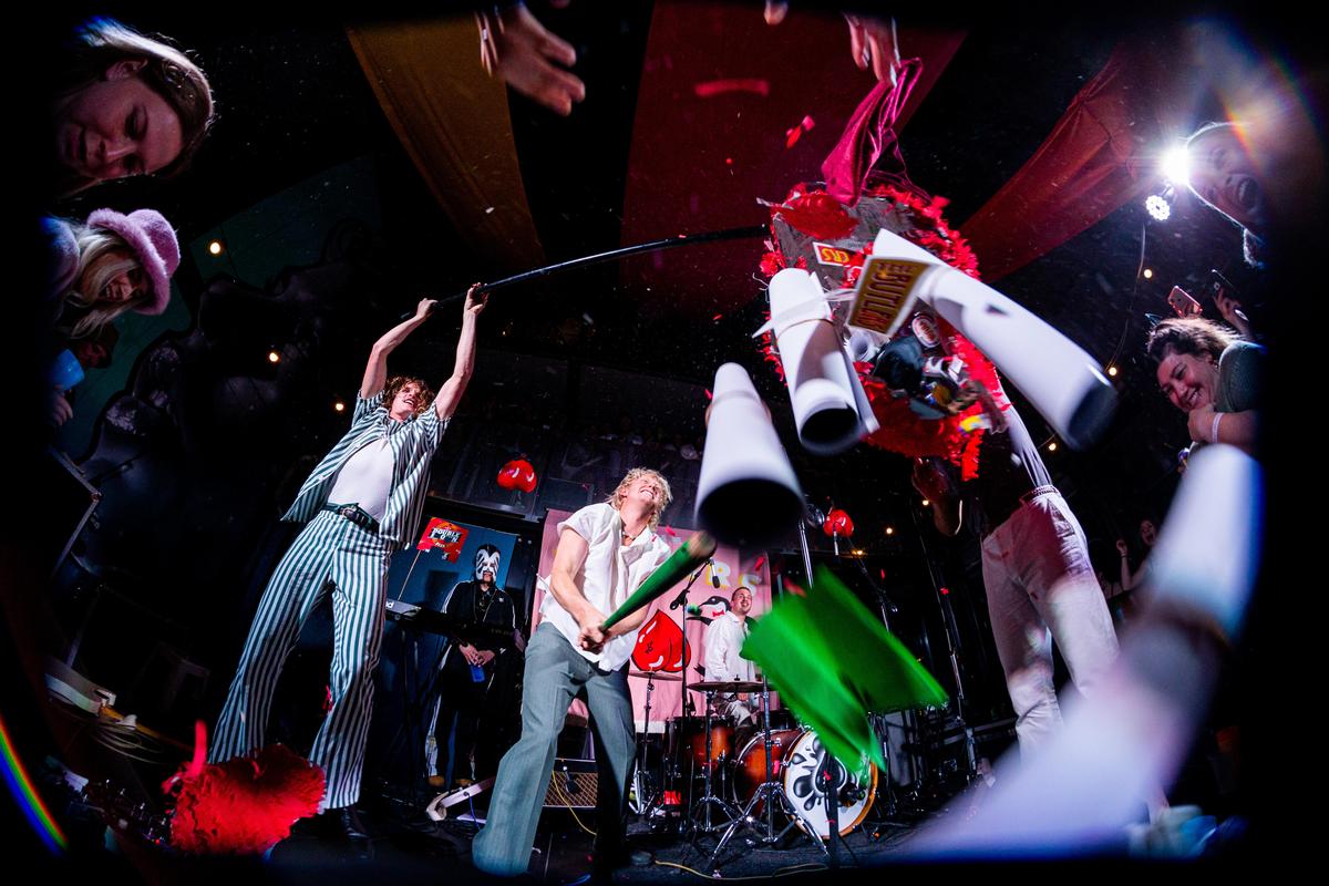 lucas perelini; Pinata; Walt of The Butlers breaks into a logo shaped pinata during their gig at Flux in Christchurch. 14/10/20
