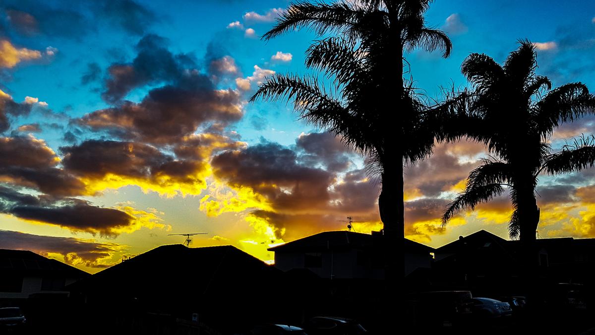 Hyun Duck Park; Skyline view from my deck ; It was beautiful Sunset. (smart phone)