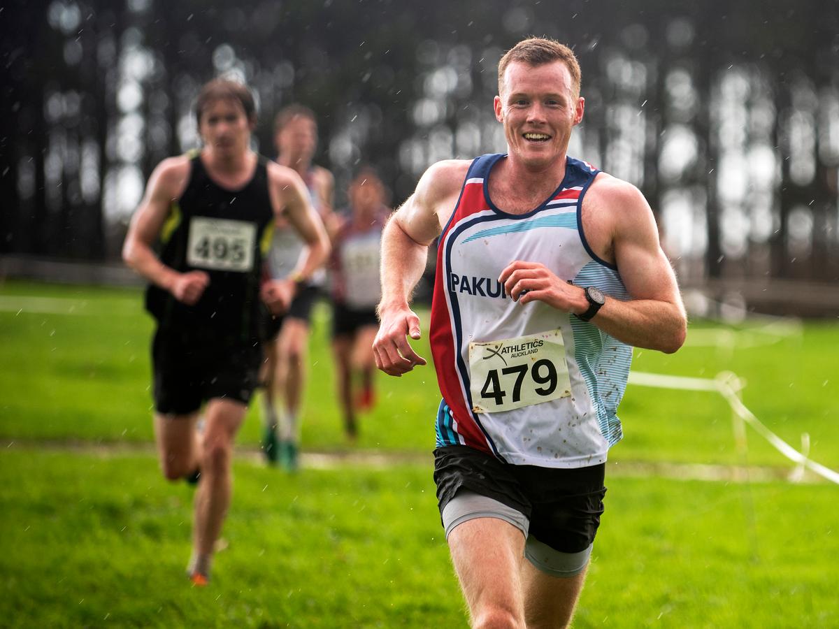 Liz Hardley;Will Laery enjoying the rain at the Auckland Teams  Cross Country Championships