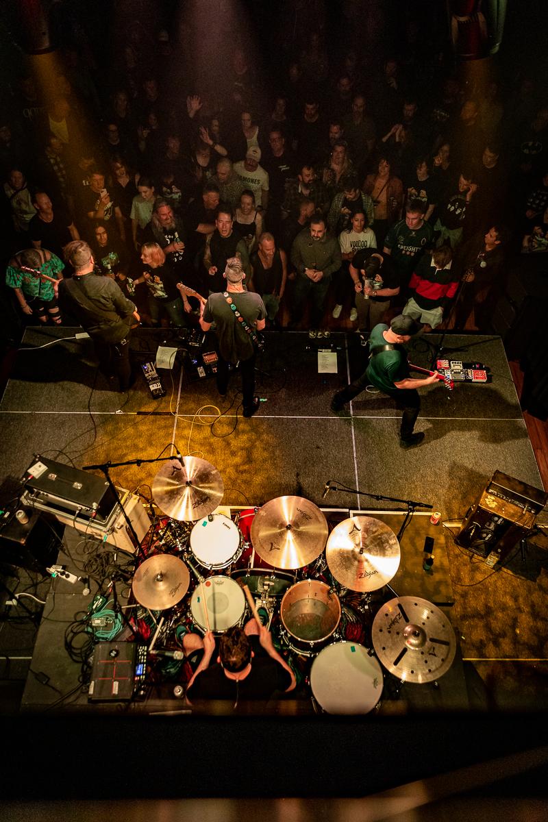 Bevan Triebels;Dead Favours   Birds Eye;Looking down onto Dead Favours as they preform in front of a pack crowd at the Loons in Lyttelton.