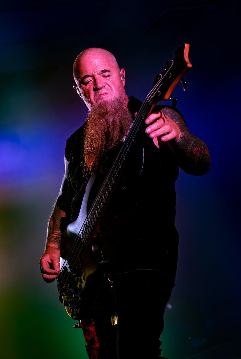Jessica Barnes;Blissful Photography  Devilskin Bass Player Paul Martin   Mount Maunganui 15th April 2023;Paul Martin jamming the bass during Devilskin's Mount Maunganui set of their Let Me Breathe Tour 2023   this image I love as it looks like something from a studio photoshoot.