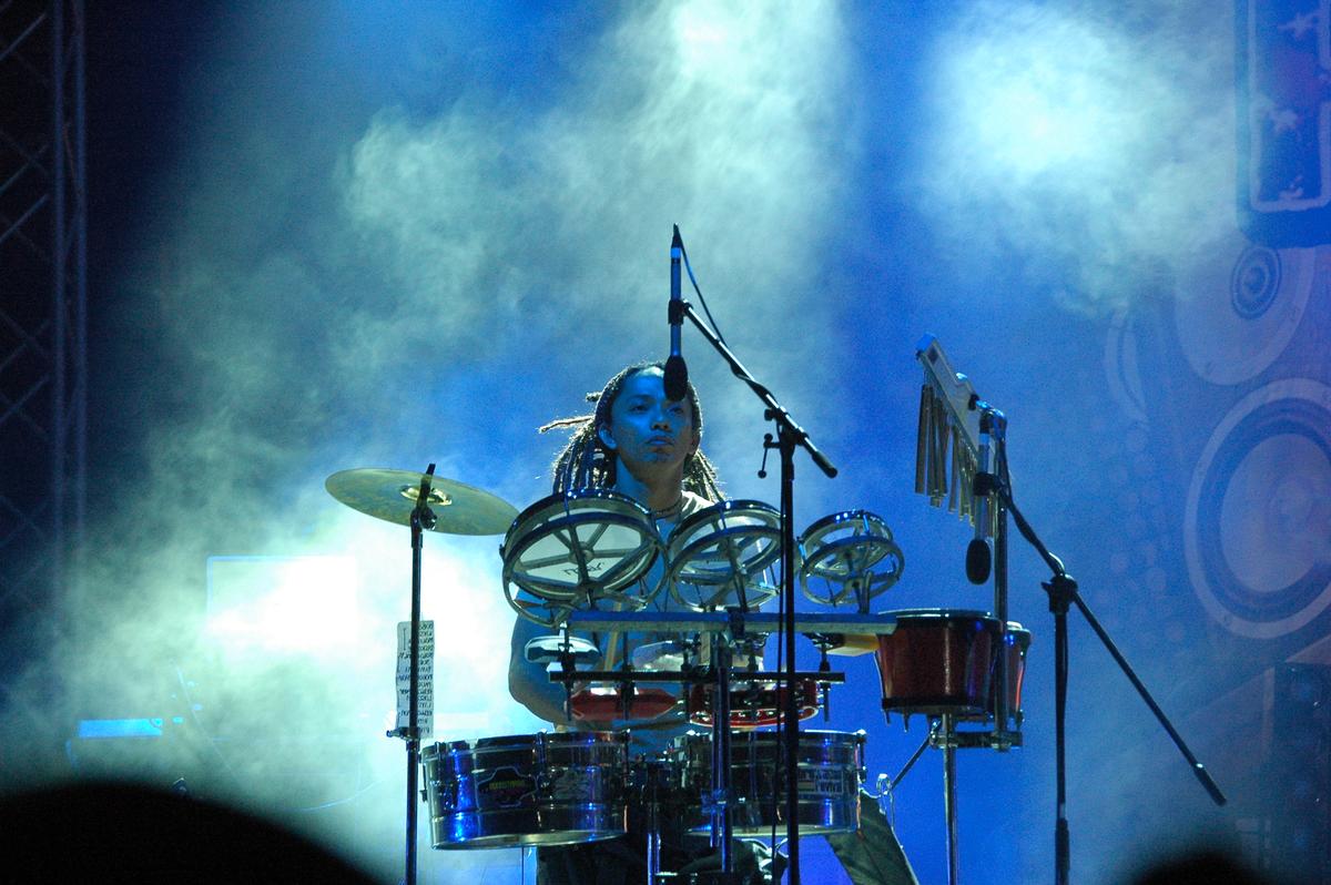 Lisandro Mendoza; Beat of the drums;The drummer seems to contemplate on his next beat on the drums.