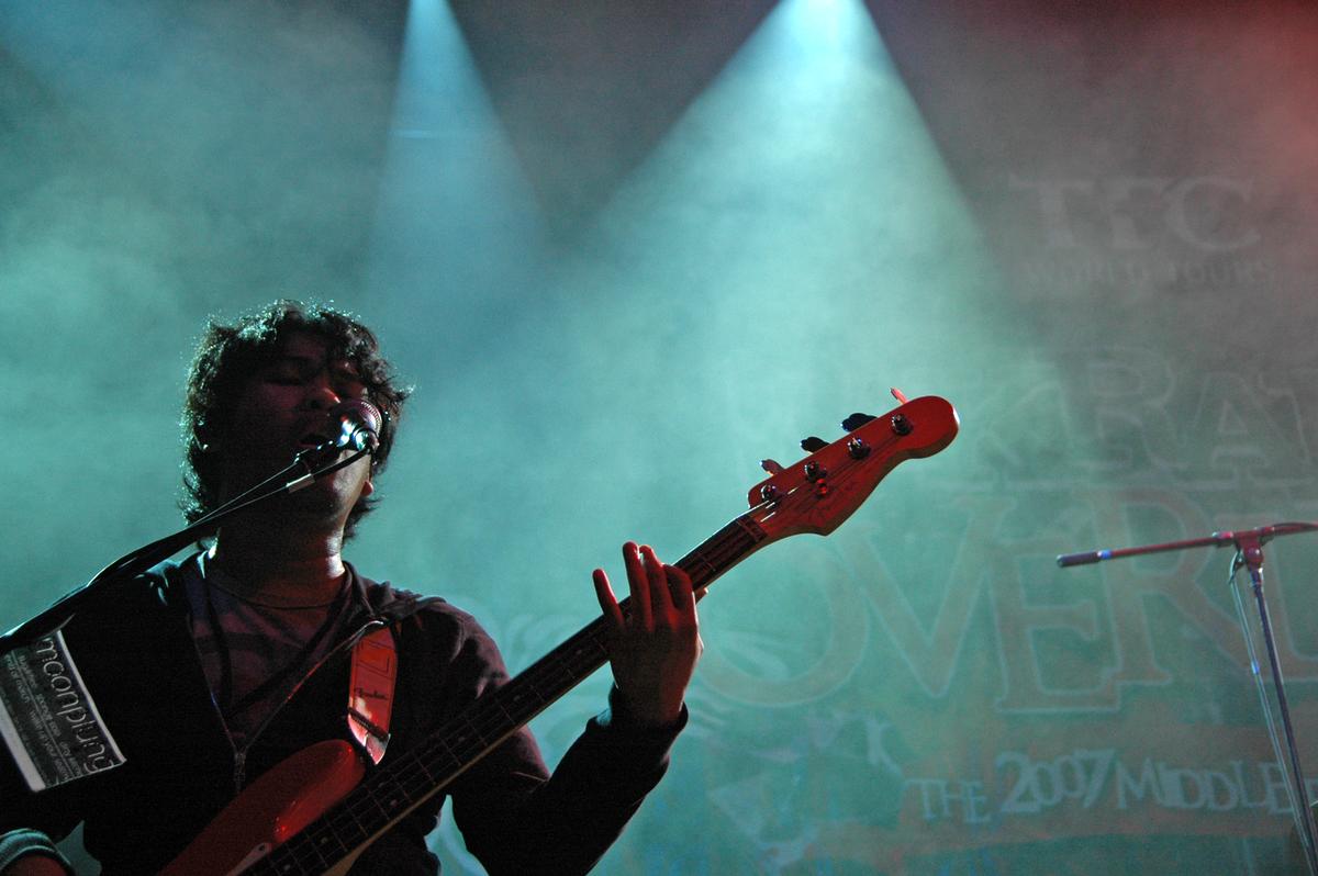 Lisandro Mendoza; Guitarist Silhouette;Soulful portrait of a guitarist.
