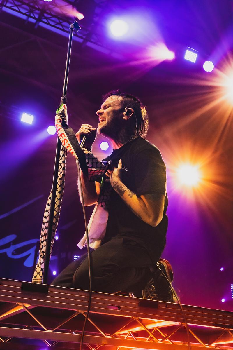 Shelley Te Haara; The Used; A moment I caught of Bert (vocalist) clasping the scarf he had tied to his microphone that said ‘Free Palestine’.