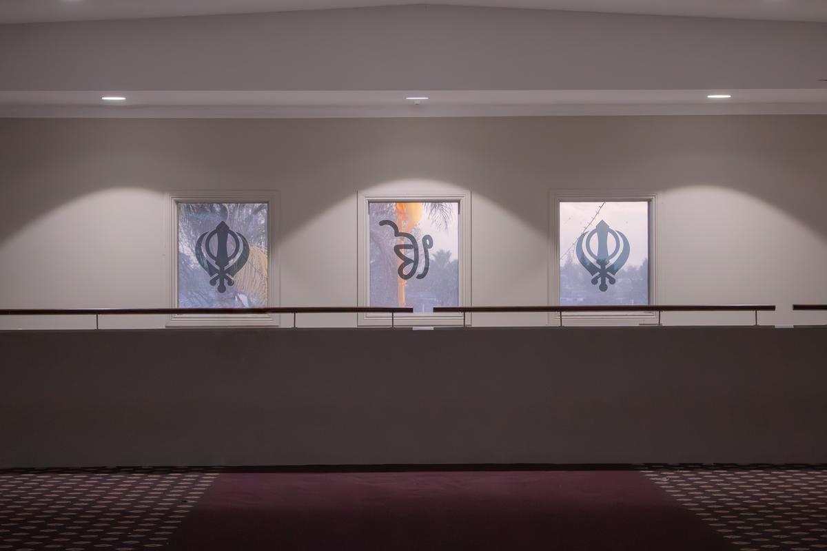 Arshpreet Kaur;Maroon Rising;This is taken from inside a local temple I have grown up in. This particular part featuring the glass has been my favourite for a very long time.