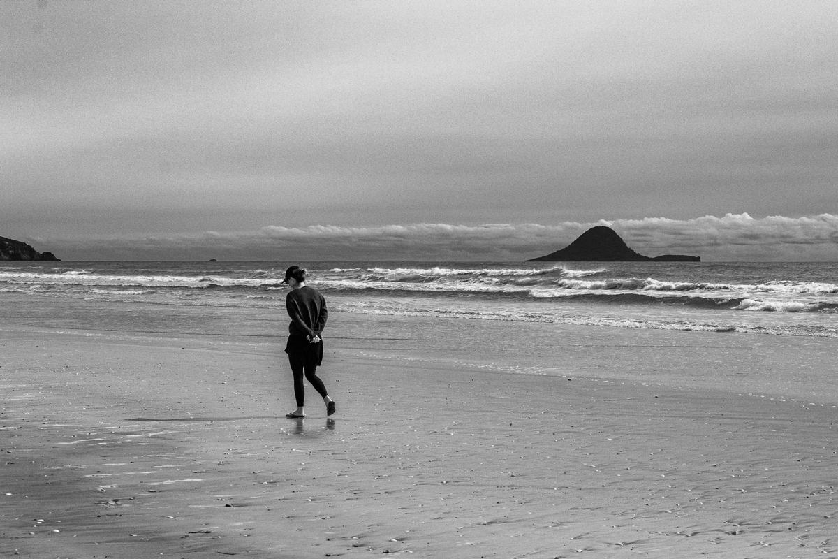 Reanna Hinds;Beachcombing;My family and I love to have competitions.  A common one is “who can find the prettiest shell” along Ohope beach.  This is my mother deep in concentration as she searches for that perfect specimen!