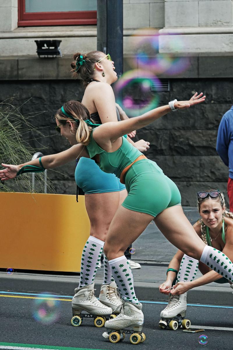 guohua wu;pulley performer;Taken at the St. Patrick's Day Parade on Queen Street in Auckland on March 18, 2023.