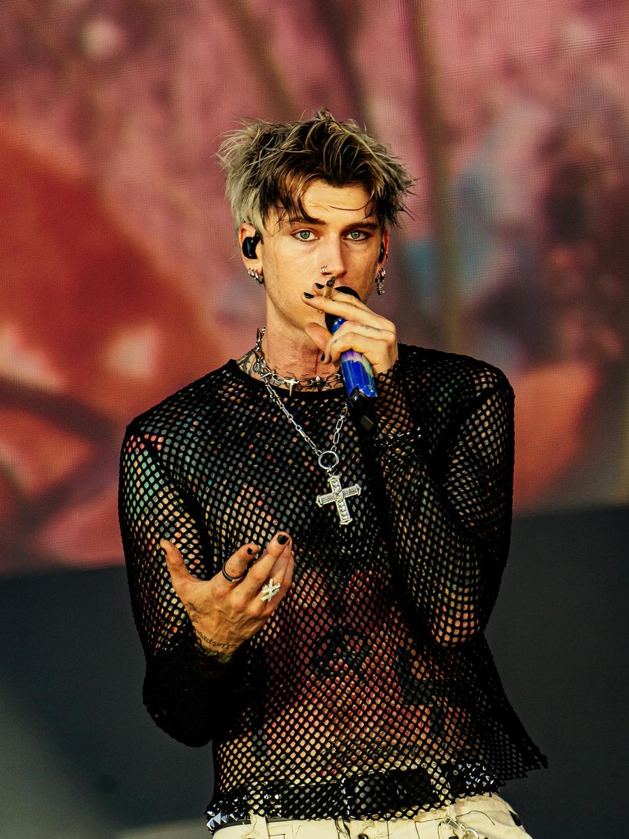 Venla Shalin;Machine Gun Kelly;Machine Gun Kelly performs on stage