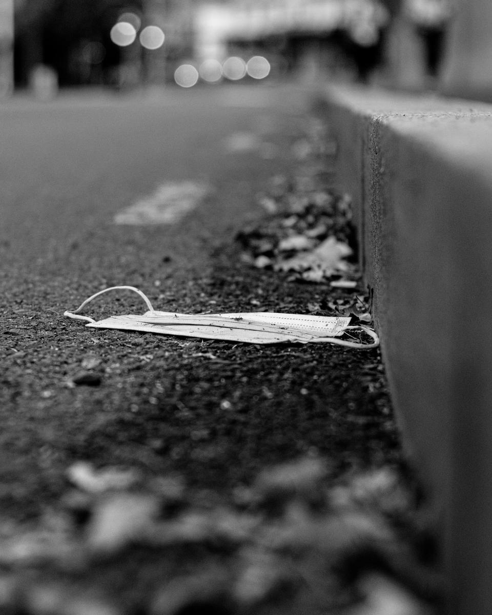 Daniel Clay;All For Nothing?;This photo provokes us to think about the ways in which we dispose of items. This photo exposes humans to their wrongdoings, in this case a lone face mask which has been littered on the ground. I also really like the contrast and the story the mask tells, as years ago during covid, masks were so prominent within society and now (as this photo shows) they possess little significance in our lives and society. It is just another piece of garbage littered along our streets. We spent years stressing about wearing masks when the reality is that in the coming years, masks would later become just new elements of litter on our streets. So, did we stress and wear them all for nothing?