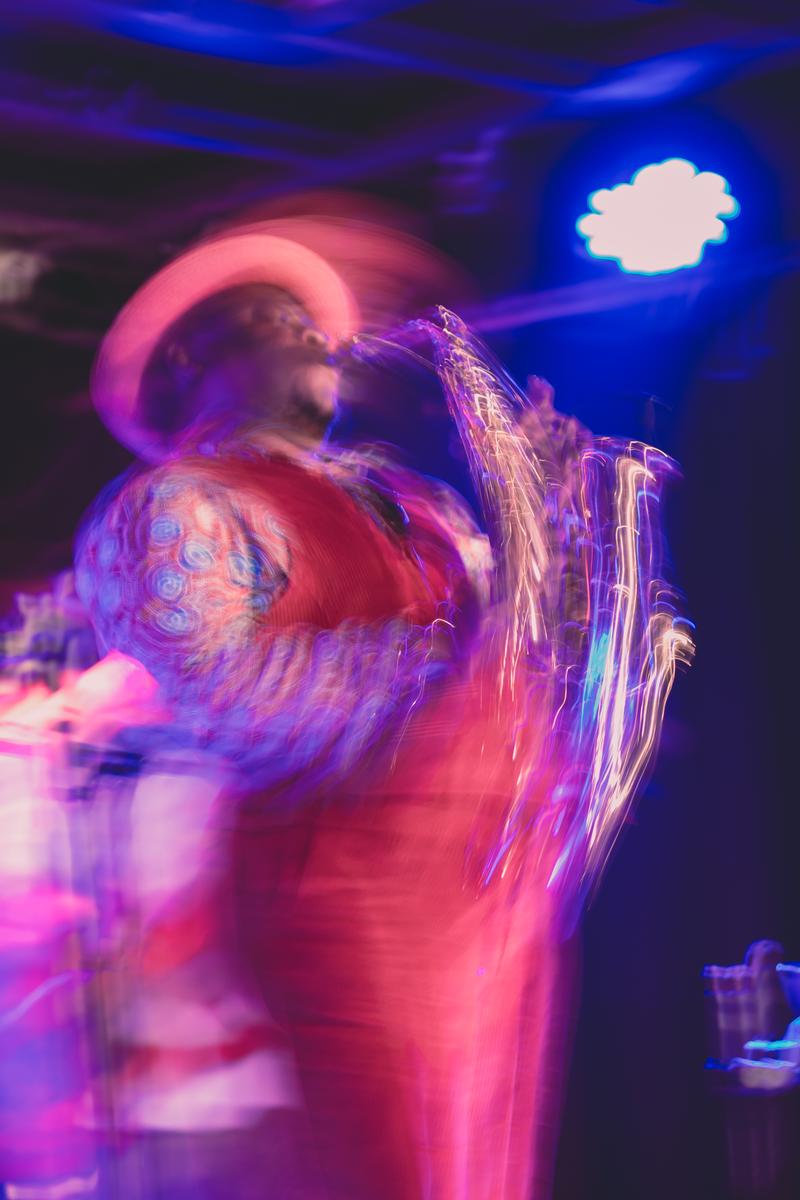 Andy Russell;Thabani Gapara;Slow shutter + vibrant saxophonist = magic. Shot at San Fran
