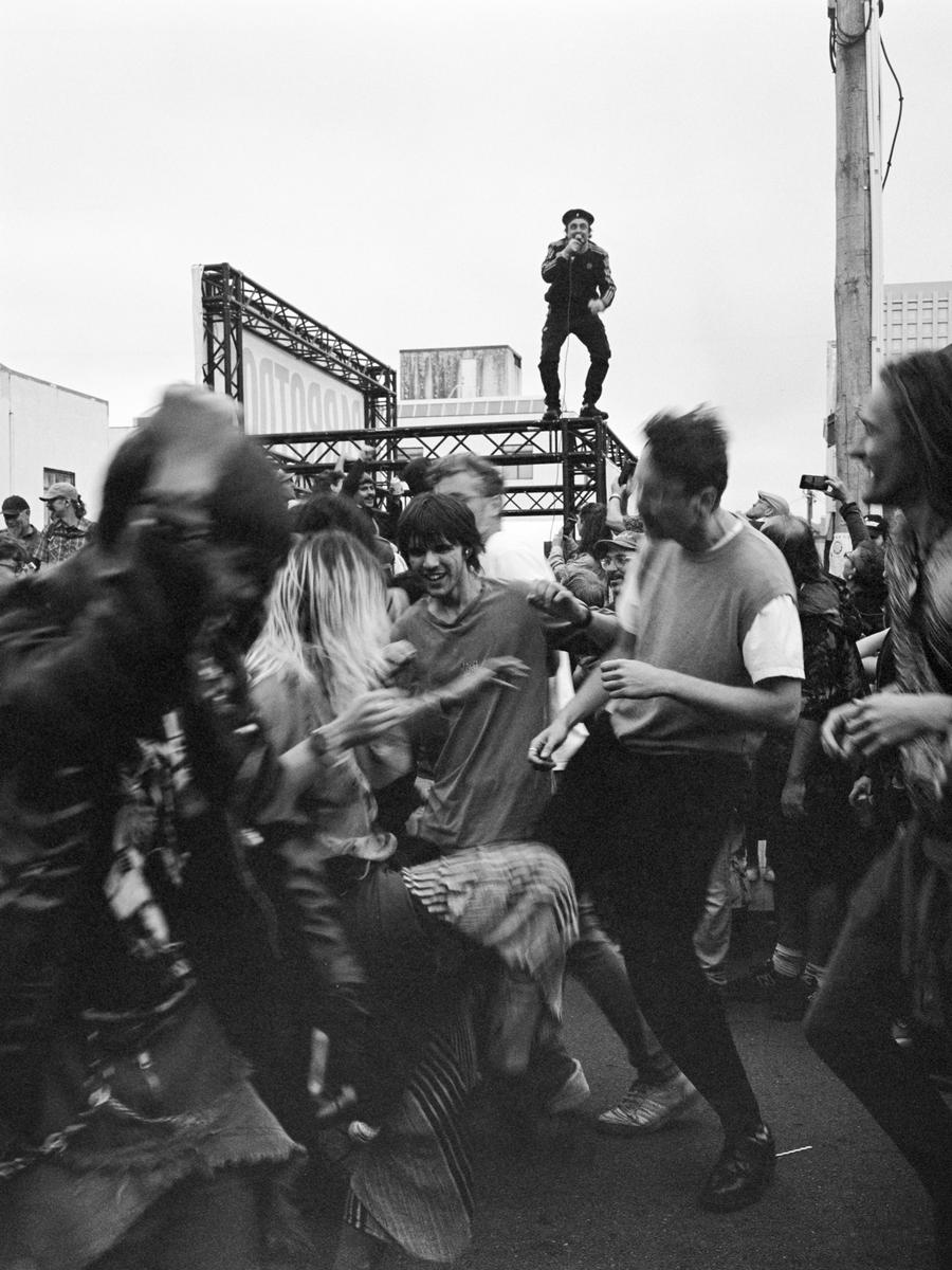 Mick Brady; Cindy on Wilson; Newtown Festival 2026. Wilson Street is always chaos, especially in the middle of a Cindy set! Shot on expired Kodak TriX film