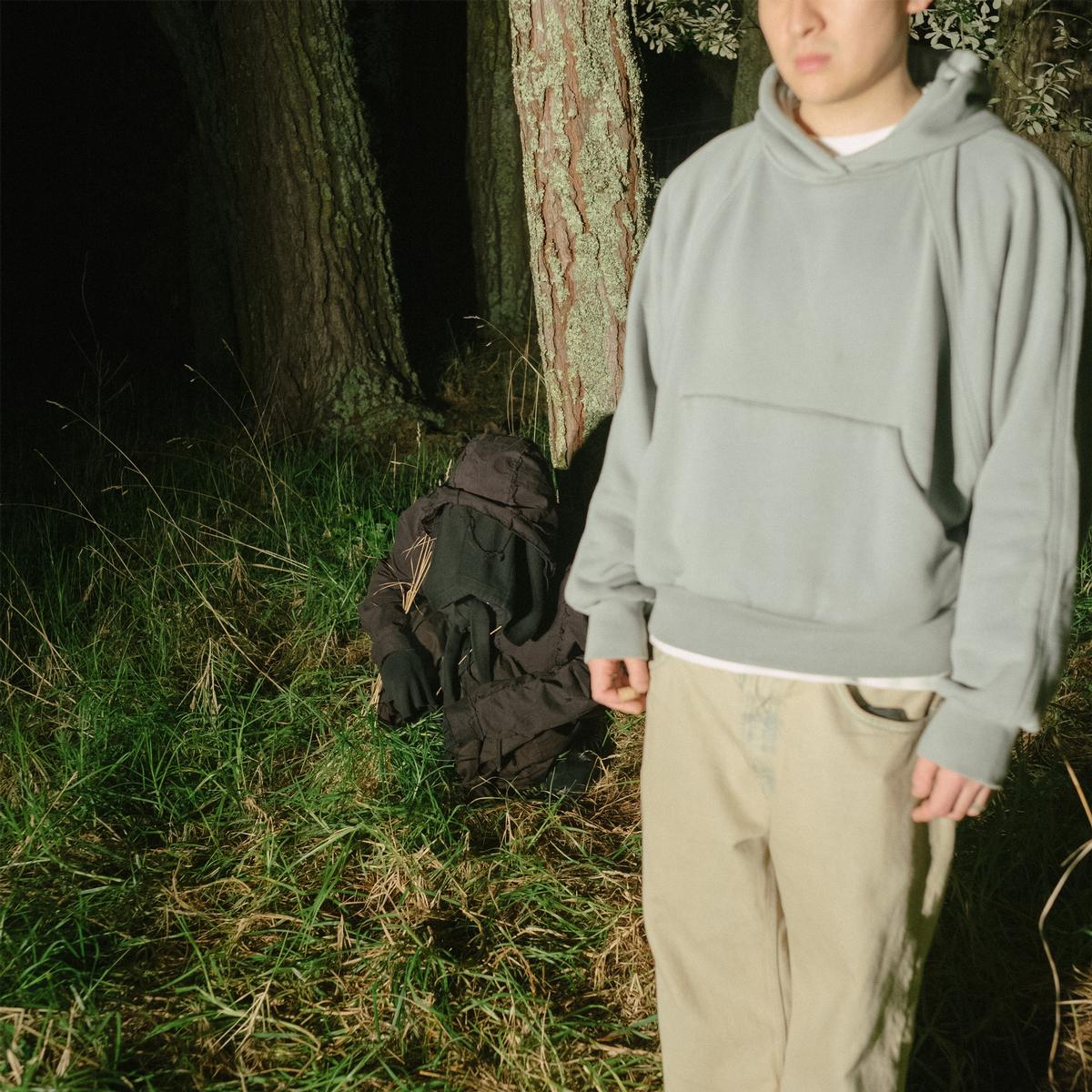 Felix Wang;untitled; created as album covers and promotional imagery for underground rap artist Emperor C. The visual concept explores the tension between the conscious and unconscious mind, drawing from the psychological theories of Carl Jung. The artist himself represents the conscious self, while a shadowy black clad figure embodies the unconscious. Inspired by horror cinema and psychological unease, the images aim to evoke tension, dread, and an unsettling atmosphere that reflects the fractured relationship between identity and the hidden self. All shots are set within Tāmaki Makaurau.