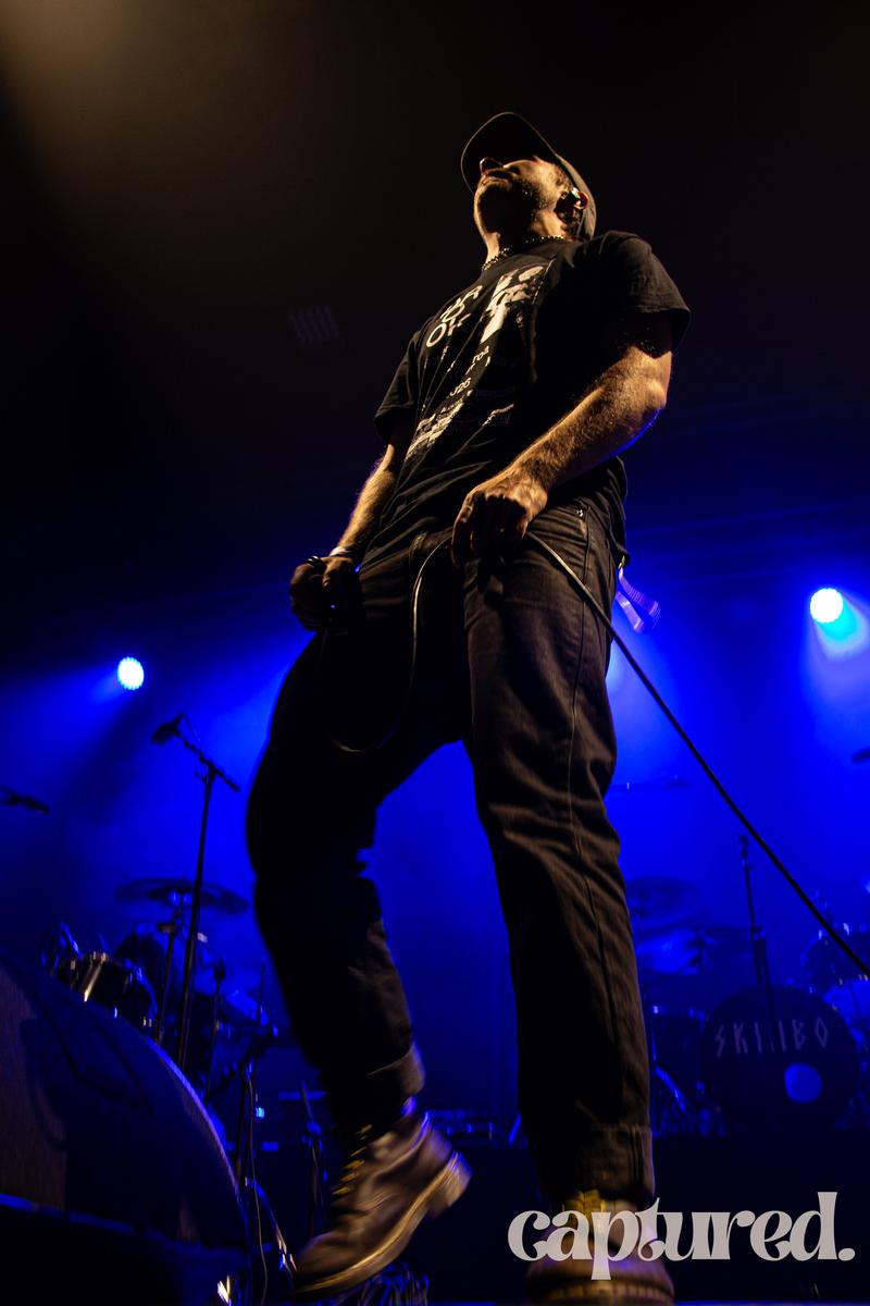 Bayley McKeown;Stage Sovereign ;An electrifying live music portrait that uses perspective, shadow, and stage light to elevate a fleeting performance moment into a powerful visual narrative.