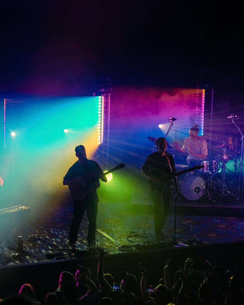Vivienne Nguyen;Rainbow Echoes: A Night with Hollow Coves;Colorful lighting, dreamy concert mood, and the band’s signature indie folk vibe when they have a music tour in New Zealand