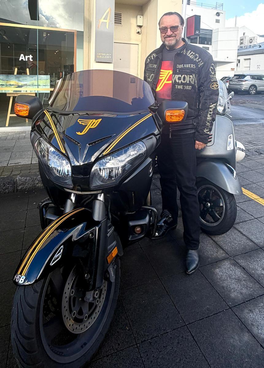 LYNN CLAYTON; Proud bike owner spiky helmet man!