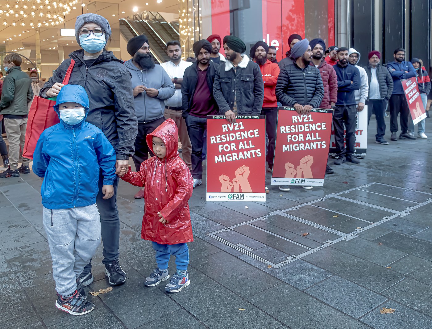 Margaret V Vickers;Kids staying close to mum at the Protest   which too place at the bottom of Queen Street, Auckland.